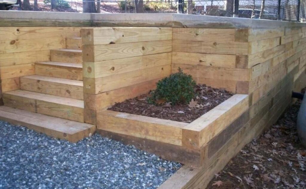 Wooden timbers to keep mulch